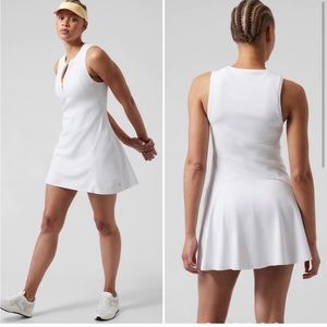 Athleta ace tennis dress in white flare with pockets.short